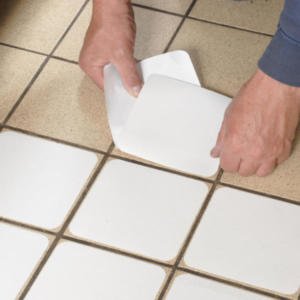 3405W-White-Aqua-Safe-140mm-140mm-Tile-Being-Laid-heskins-vluchtwegaanduidingen